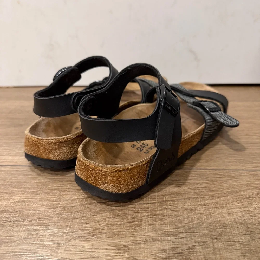 Birki’s lilie Birkenstocks Black with white strapped Sandals, size 38